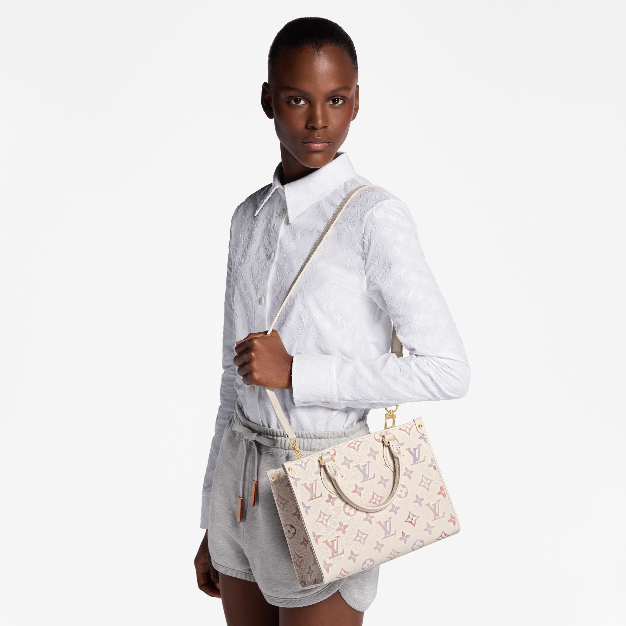 Couro Monogram Empreinte Bolsas Femininas Ícones LV Bolsa Tote OnTheGo PM | Louis Vuitton ® (Zoom no Produto)