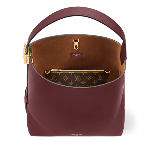 H33 Bolsas Todas as Bolsas Low Key Hobo MM | Louis Vuitton ® (Zoom no Produto)